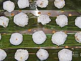 Tapioca balls on oiled banana leaf for steaming