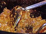 Cooking the dry curry in oil, Southern style