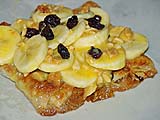 Assembling banana-stuffed roti