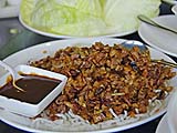Peking duck ''two ways'' - duck meat with lettuce wraps