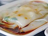 Fresh Rice Noodle Roll stuffed with sliced fish