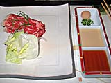 Wagyu-style beef, cabbage, and sesame and ponzu (citrus) dipping sauces